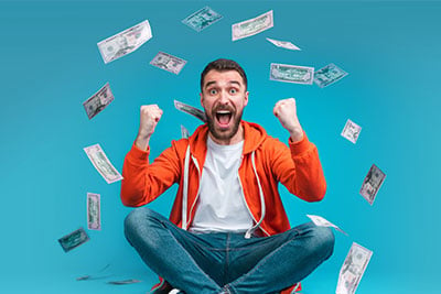 Man-excited-about-falling-money---CD-Home-Page-Image-400-x-267