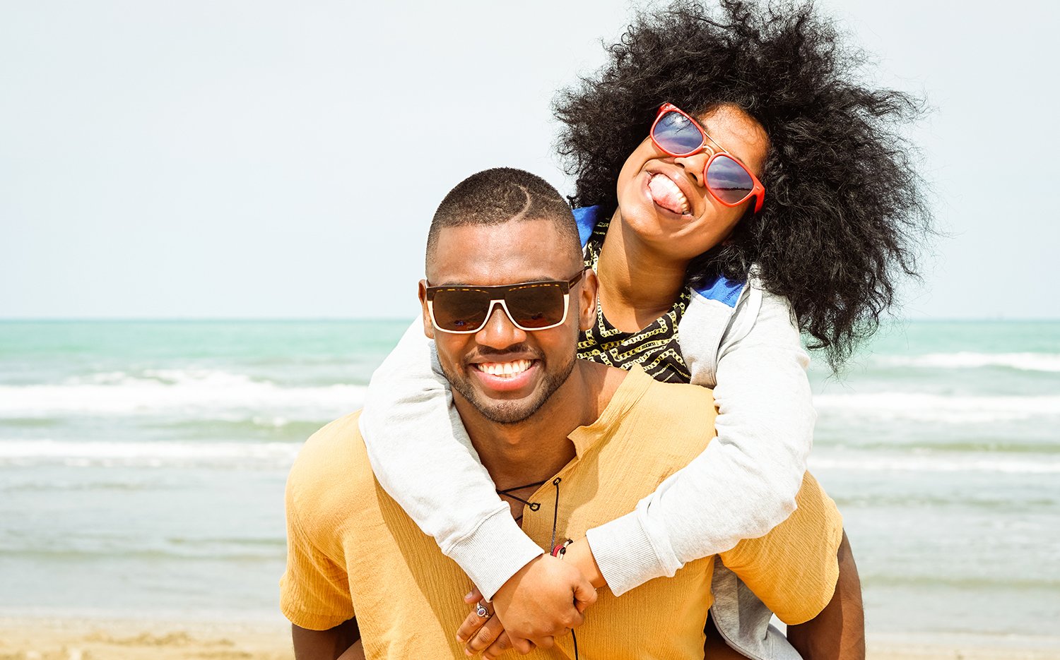 A couple enjoys a beach vacation financed through a home equity loan.
