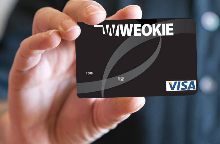 Hand-holding-black-weokie-visa-credit-card