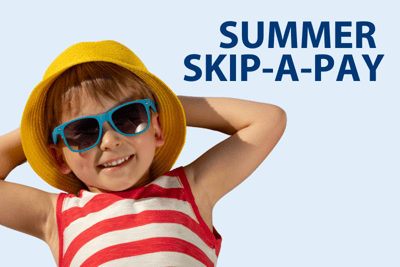 A kid in a had and sunglasses.