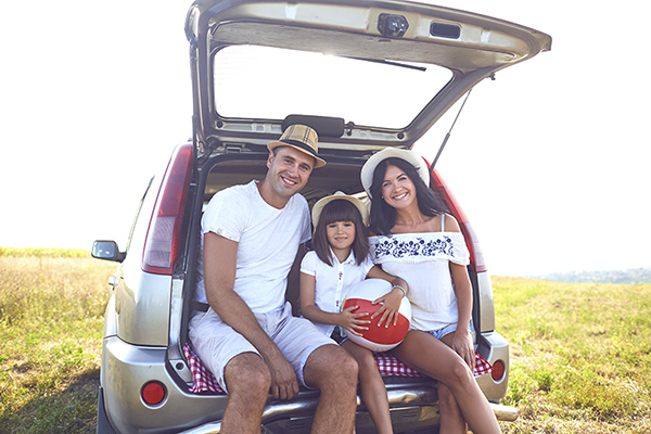 family in car