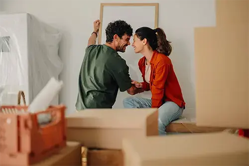 Happy homebuyers moving into a new home