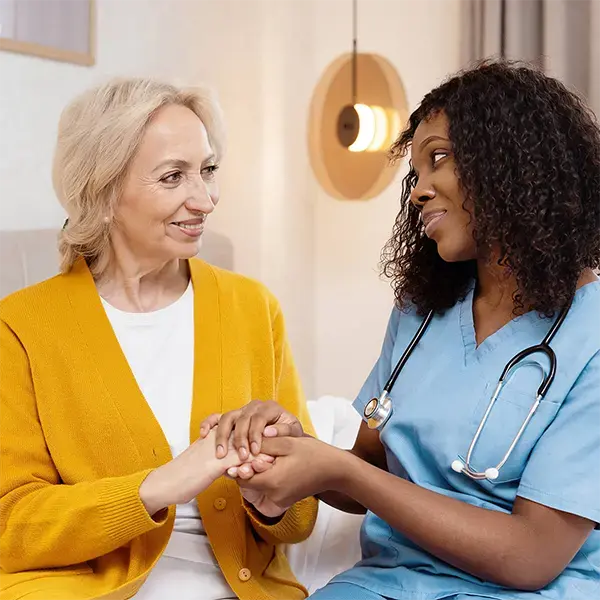 Healthcare provider comforting a patient for Primary Health Partners direct primary care