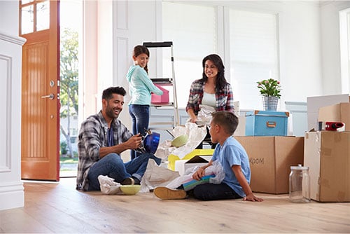 Hispanic-family-moving-into-new-home